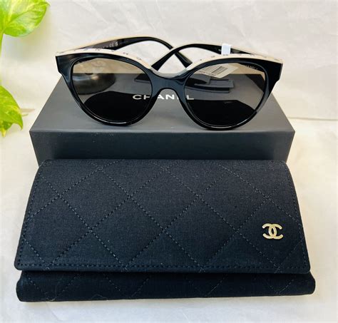 chanel butterfly sunglasses black and beige|Chanel ch5414.